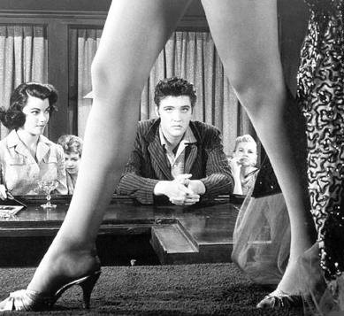 Jailhouse Rock (1957) starring Elvis Presley and Judy Tyler. The great legs of striptease dancer belong to the uncredited Gloria Pall.